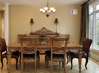 A dining area with a Wall Heater installed