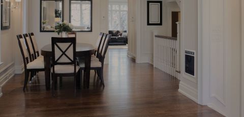 An indoor dining area with an NLW Series heater built into a wall