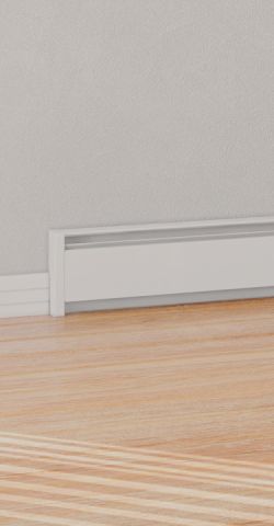 A Cadet Softheat Baseboard heater mounted onto the wall