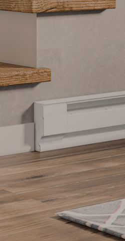 A living space with a Cadet Baseboard heater mounted onto the wall