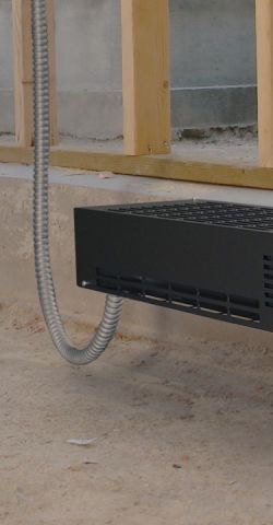 A Frost Protection Heater mounted to an outside wall