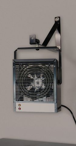 A Garage and Workshop heater mounted to a wall