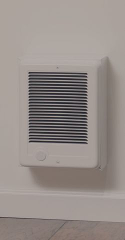 A Cadet heater mounted onto a wall
