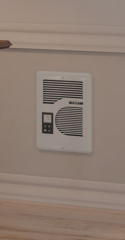 A small heater on a wall