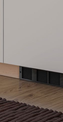 An electric heater build in under a cupboard